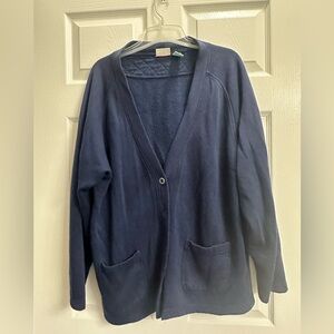 Navy blue fleece sweater. Size Large, with pockets.  Very soft!